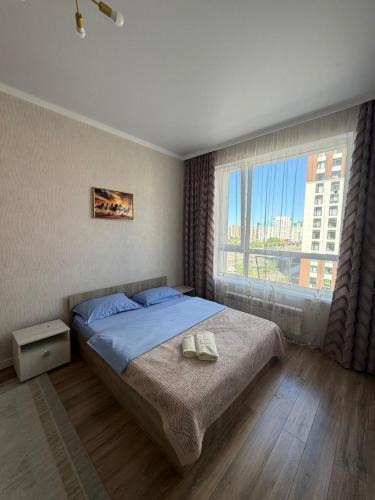 Almaty District Apartment | Аппартаменты около Аллей Мынжылдык