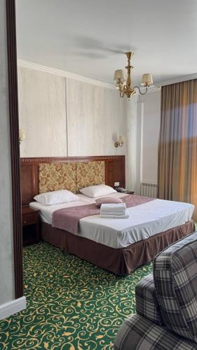 Almaty District Hotel | Белес