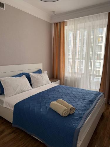 Almaty District Apartment | ЖК Молодежный рядом Нурлы-Жол и станция ЛРТ, ЖД Вокзал