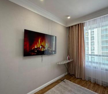 Almaty District Apartment | ЖК Молодежный рядом Нурлы-Жол и станция ЛРТ, ЖД Вокзал