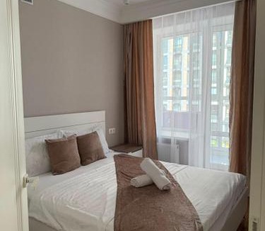 Almaty District Apartment | ЖК Молодежный рядом Нурлы-Жол и станция ЛРТ, ЖД Вокзал