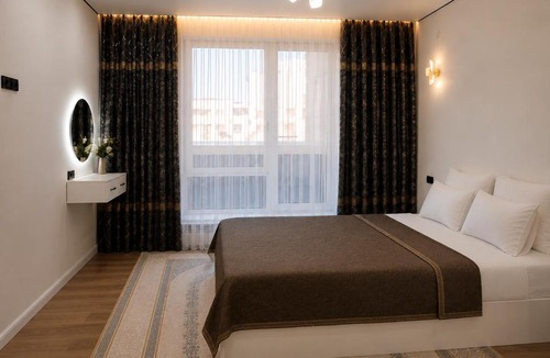 Shymkent Apartment | ЖК Capital City уютная 2х комнатная квартира с террасой и балконом, рядом с парком, музыкальным фонтаном Shymkent City и Qyzgaldaq sarayi