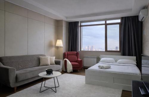 Almaty District Apartment | 12эт ШИКАРНЫЙ ВИД на Хазрет Султан,с 2мя кроватями,раскладной диван, 2 санузла