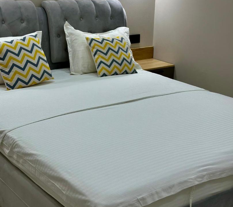 Aktobe Apartment | Двухкомнатные апартаменты в центре Актобе с двумя кроватями