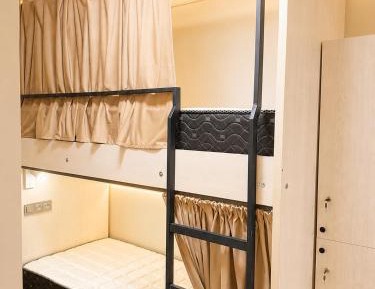 Single Bed in Dormitory Room