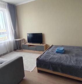 One-Bedroom Apartment with Balcony and City View