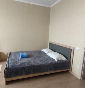 One-Bedroom Apartment with Balcony and City View