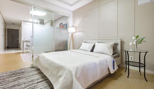 One-Bedroom Apartment with Balcony and City View