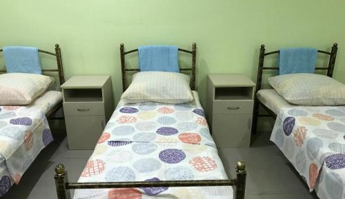Single Bed in Female Dormitory Room