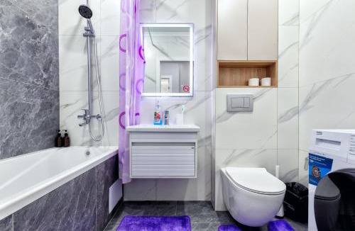 Almaty District Apartment | "Гималайская роза" уютная квартира возле вокзала Нурлы жол