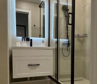 Tuzdybastau Apartment | minimalistic blue apartments рядом Aport Mall East