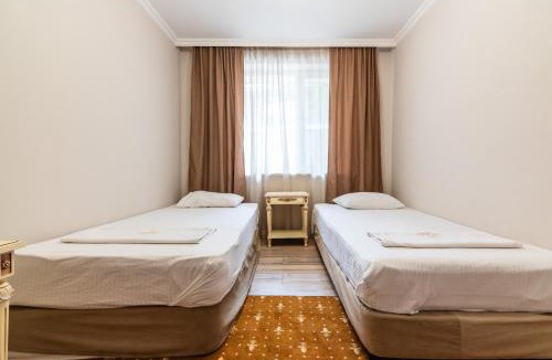 Bostandyk District Hotel | Tau Shyraq