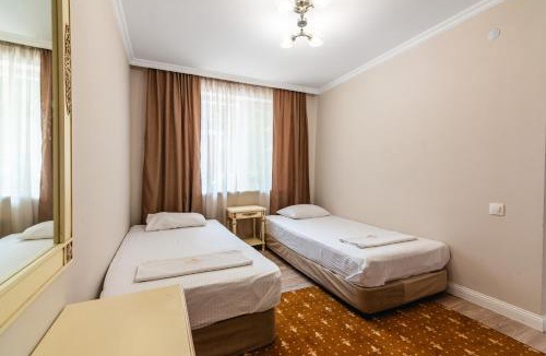 Bostandyk District Hotel | Tau Shyraq