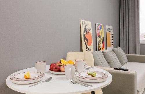 Yesil District Apartment | Мягкое гнёздышко с креслом у Хан-Шатыра